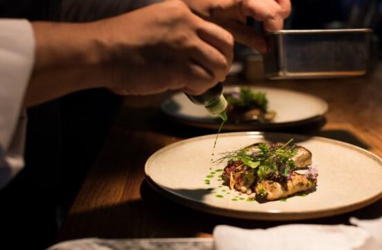 chef-cooking-plate-with-pesto